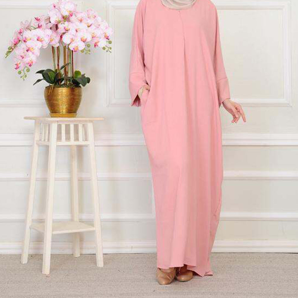 Abaya fluide minimaliste – Tendance Modest Fashion 2025