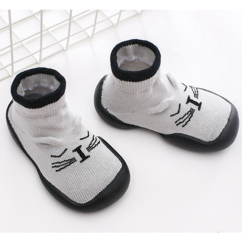 Chaussons‑chaussettes bébé antidérapants – Maille douce & semelle souple pour premiers pas