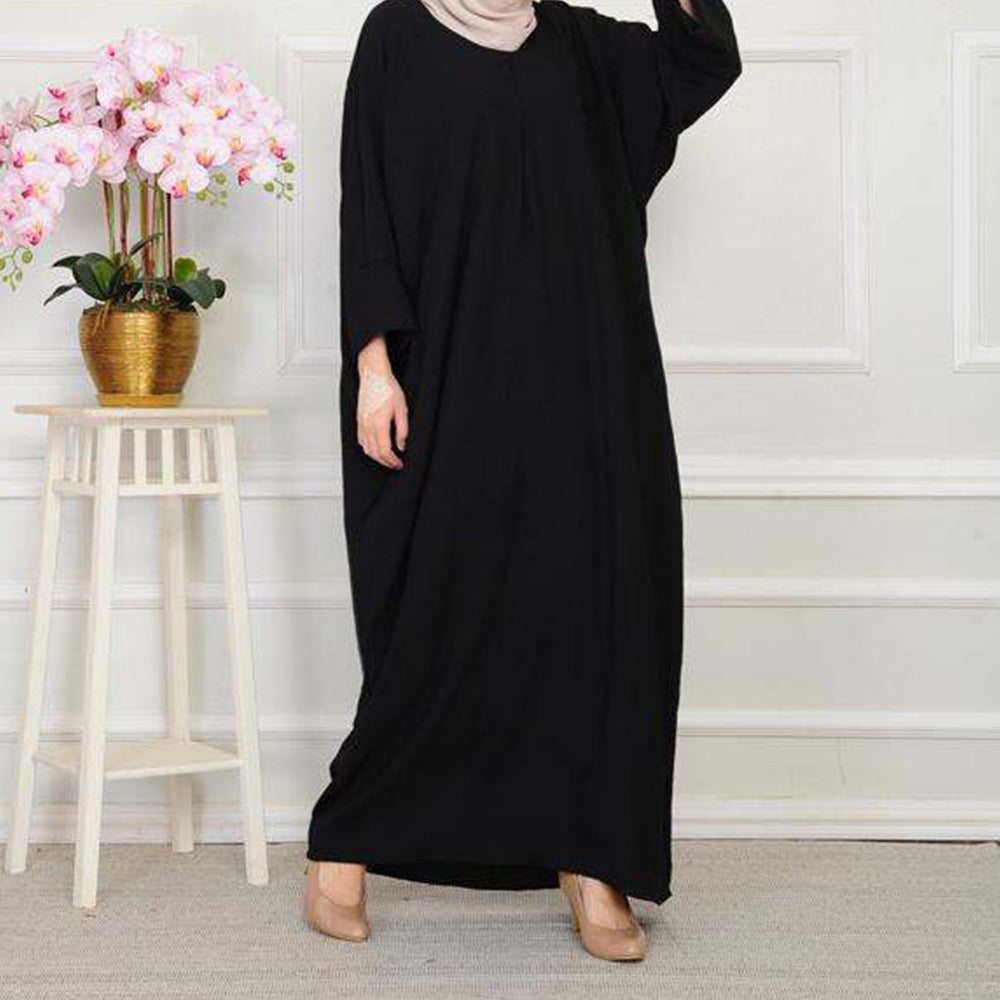 Abaya fluide minimaliste – Tendance Modest Fashion 2025