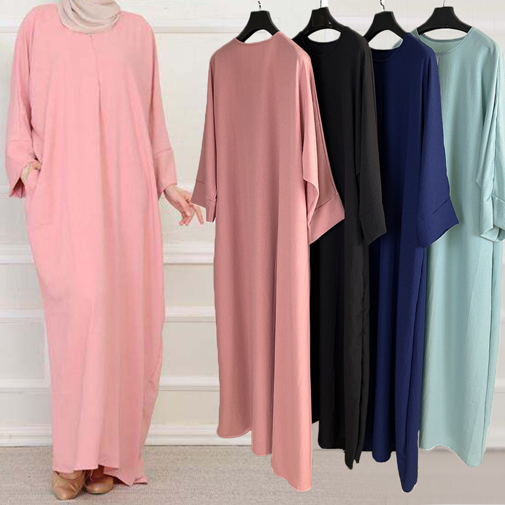 Abaya fluide minimaliste – Tendance Modest Fashion 2025