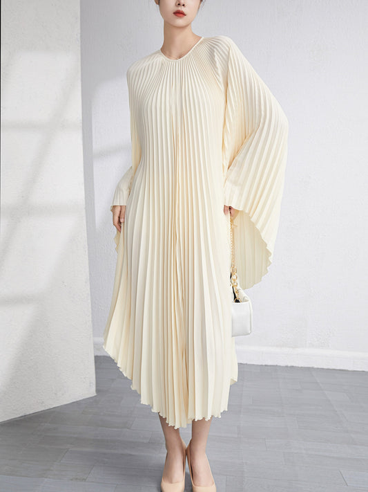 Robe plissée fluide “Crème Élégance” – Style luxe plage ou urbain