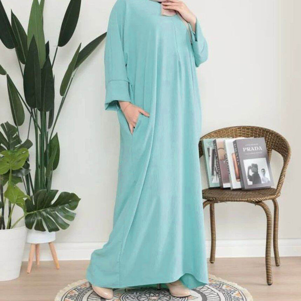 Abaya fluide minimaliste – Tendance Modest Fashion 2025
