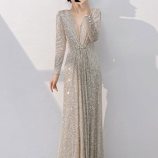 Robe de Soirée Longue Argentée – Sequins de Luxe